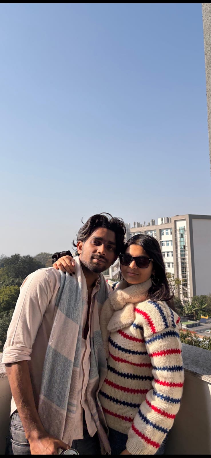 Rooftop sun, scarves, and that 'us' kind of cool.